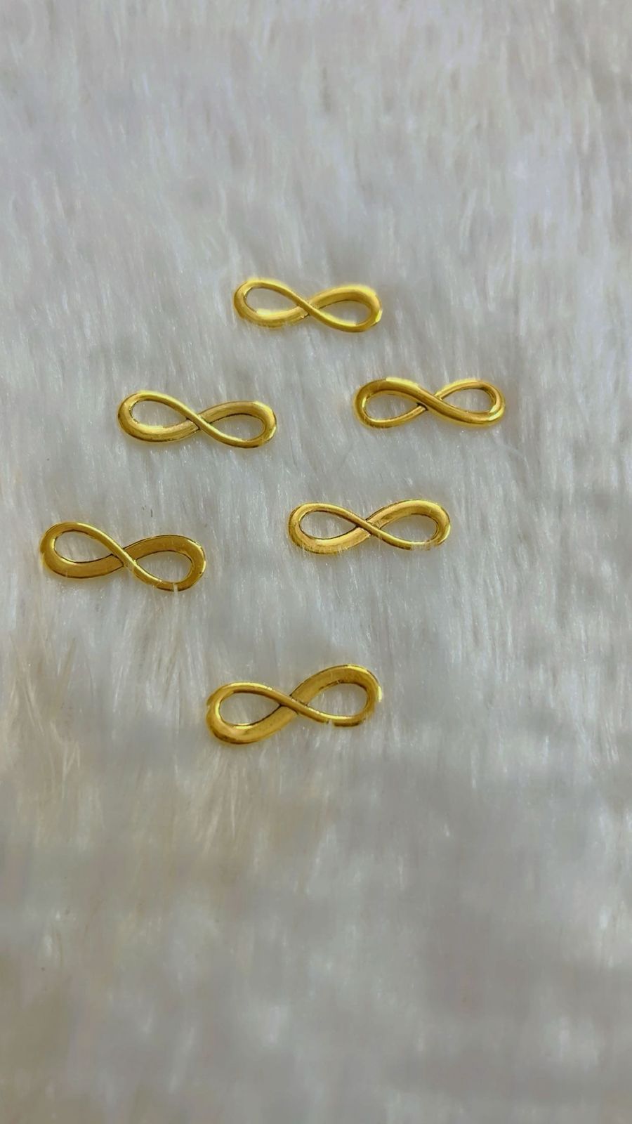 Infinite Rakhi Charm